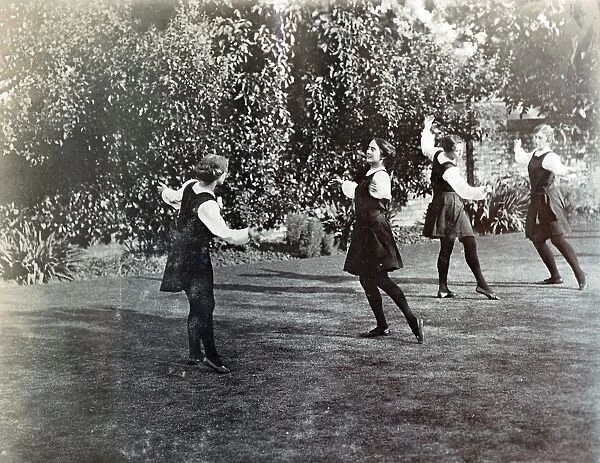 Four Seniors dancing in the garden