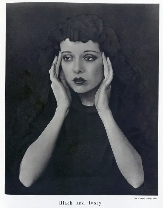 Framed Print : Sepha Treble, actress, (1908-1995), studio portrait wearing black mantilla. Captioned, Black and Ivory'. With description, Sepha Treble Wears a Mantilla; A black dress and a black lace mantilla, Sepha Treble's face and hands Framed Print : Sepha Treble, actress, (1908-1995), studio portrait wearing black mantilla. Captioned, Black and Ivory'. With description, Sepha Treble Wears a Mantilla; A black dress and a black lace mantilla, Sepha Treble's face and hands
