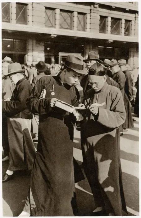 Framed Print : Shanghai Races - studying the form-book Framed Print : Shanghai Races - studying the form-book