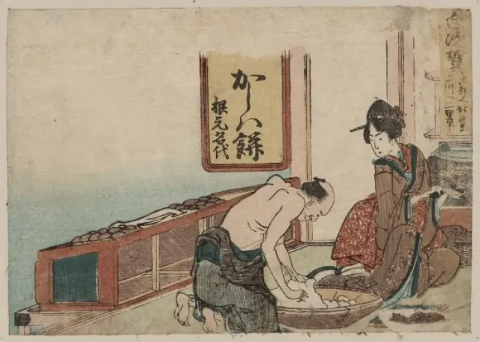 Framed Print : Shirasuka. Print shows a man and a woman in domestic setting with bowl of fabric or clay Framed Print : Shirasuka. Print shows a man and a woman in domestic setting with bowl of fabric or clay