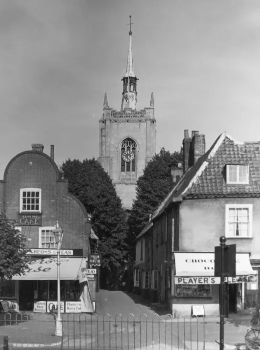 Framed Print : Shops and the church, viewed from the Market Place, Swaffam, Norfolk, England Framed Print : Shops and the church, viewed from the Market Place, Swaffam, Norfolk, England