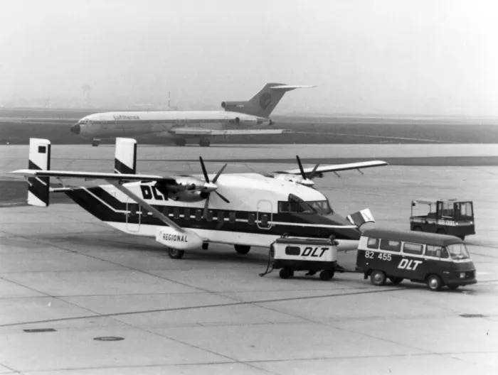 Framed Print : Short 330 of DLT with a Boeing 727 of Lufthansa behind Framed Print : Short 330 of DLT with a Boeing 727 of Lufthansa behind