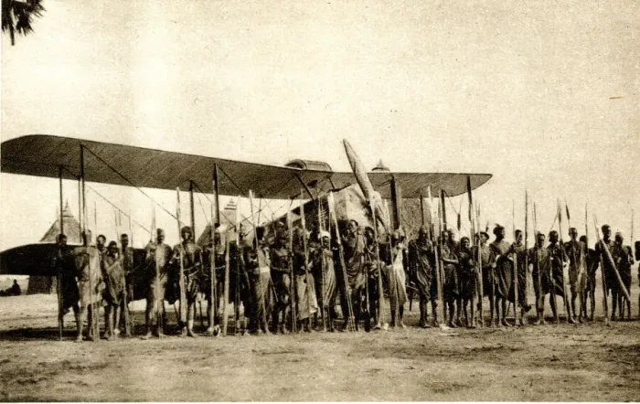 Framed Print : Shulluks pose by Cobhams aeroplane, Malakal, Sudan Framed Print : Shulluks pose by Cobhams aeroplane, Malakal, Sudan