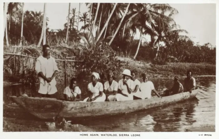 Framed Print : Sierra Leone - Family in a log canoe Framed Print : Sierra Leone - Family in a log canoe