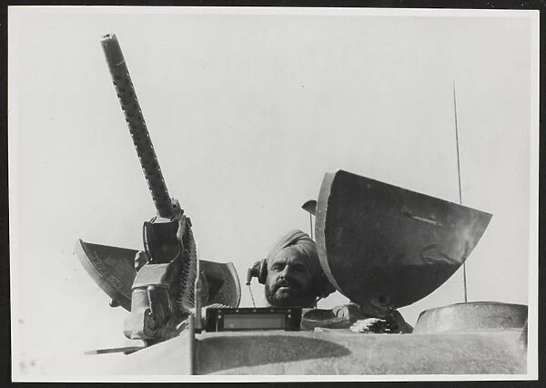Sikh tank commander in the turret of his vehicle