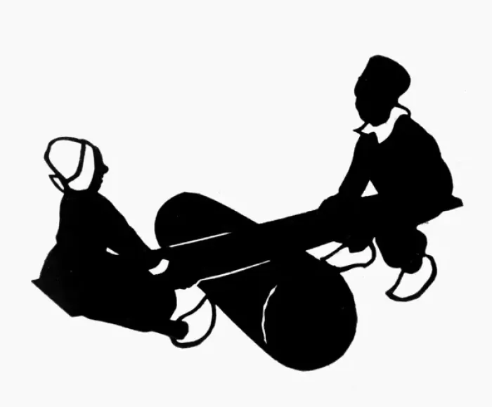 Framed Print : Silhouette of Dutch children on a seesaw Framed Print : Silhouette of Dutch children on a seesaw