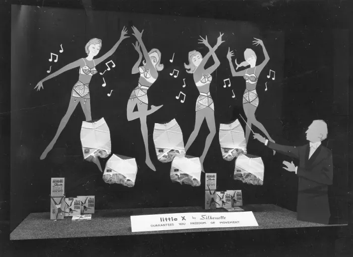 Framed Print : Silhouette, Little X corsets with Lycra, window display Framed Print : Silhouette, Little X corsets with Lycra, window display