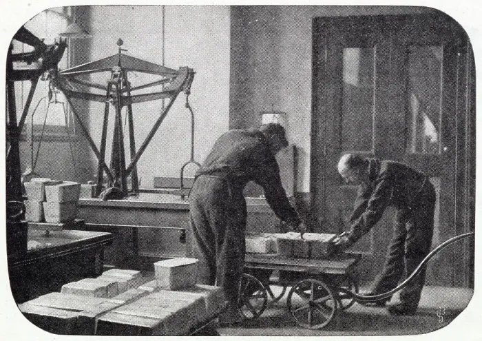 Framed Print : After the silver ingots had been weighed, they were marked and portioned out to the amount of alloy necessary to ensure that the result of the coins would be of the legal standard weight. Date: 1904 Framed Print : After the silver ingots had been weighed, they were marked and portioned out to the amount of alloy necessary to ensure that the result of the coins would be of the legal standard weight. Date: 1904