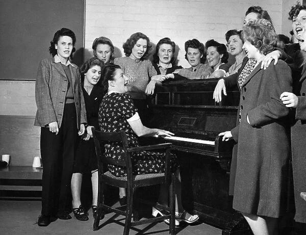 Singing round the piano, c. 1946