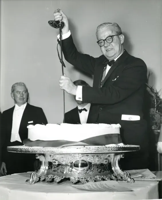 Framed Print : Sir George Gardner, RAeS President 1965-1966, cuts the c? Framed Print : Sir George Gardner, RAeS President 1965-1966, cuts the c?