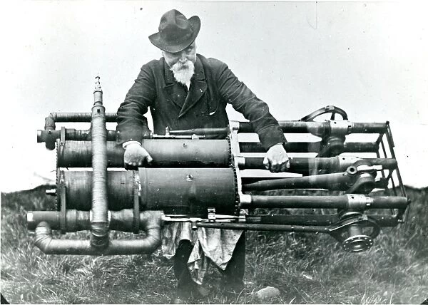 Sir Hiram Maxim in 1894 with one of the two steam engine?