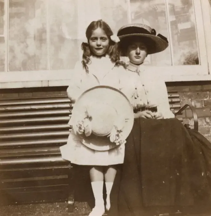 Framed Print : Two sisters on a garden bench Framed Print : Two sisters on a garden bench