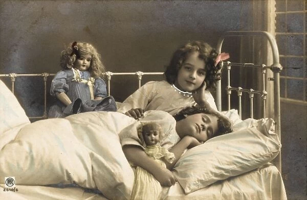 Sisters Sleep with Dolls