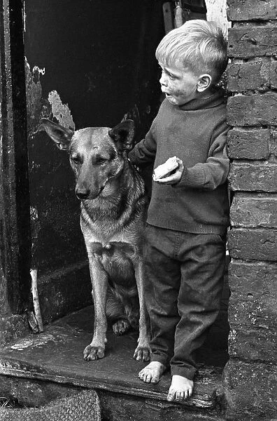 slum child with dog