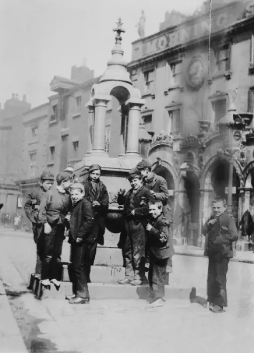 Framed Print : Slum life. Slum Life, boys around fountain, 1892 Date: 1892 Framed Print : Slum life. Slum Life, boys around fountain, 1892 Date: 1892