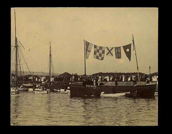Small boat dressed with flags