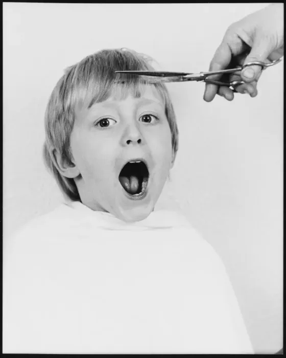 Framed Print : Small boy having a haircut Framed Print : Small boy having a haircut
