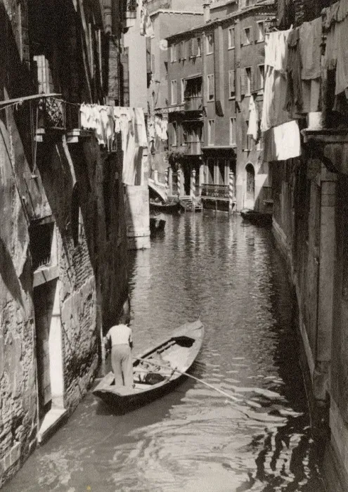 Framed Print : A small back canal, Venice, Italy - A local man off shopping Framed Print : A small back canal, Venice, Italy - A local man off shopping