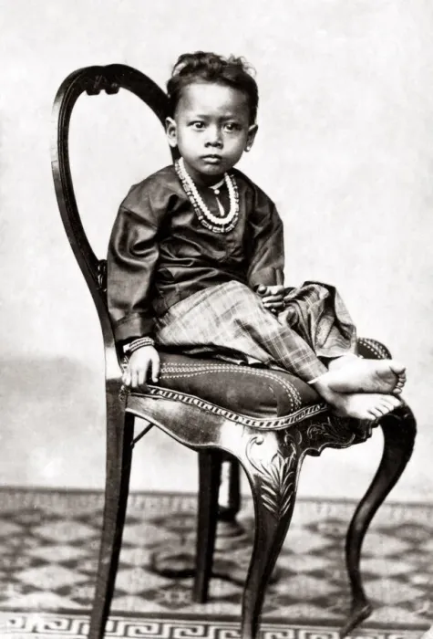 Framed Print : Small Malay child, circa 1880s. Date: circa 1880s Framed Print : Small Malay child, circa 1880s. Date: circa 1880s