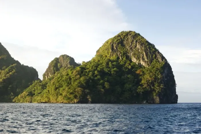 Framed Print : Small rocky volcanic island near El Nido Framed Print : Small rocky volcanic island near El Nido