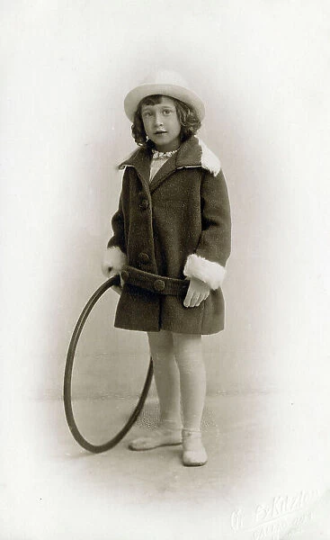 Smart well-to-do young girl with her hoop - Buenos Aires