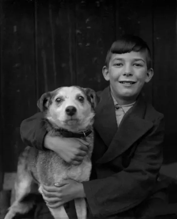 Framed Print : A smiling boy and his terrier dog Framed Print : A smiling boy and his terrier dog