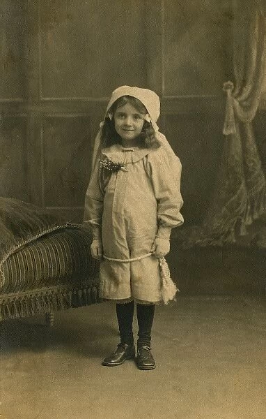 Smiling girl wearing a hood