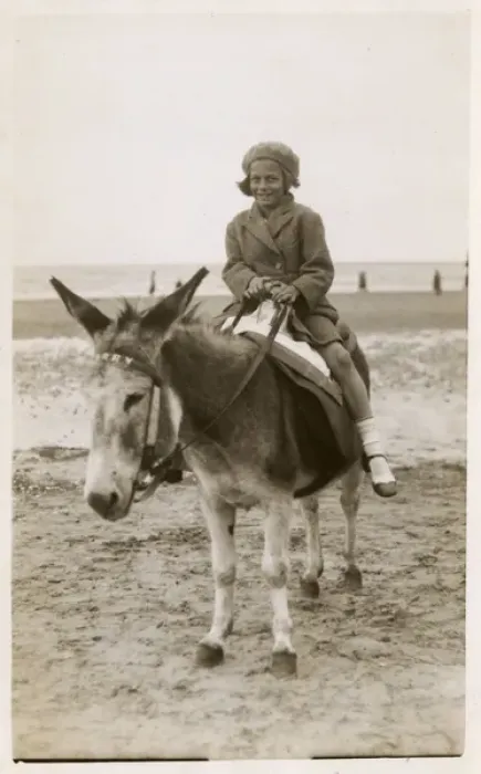 Framed Print : Smiling young girl taking a donkey ride - Margate, Kent Framed Print : Smiling young girl taking a donkey ride - Margate, Kent