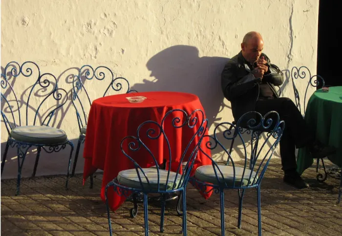 Framed Print : Smoker outside cafe, Mijas, Spain Framed Print : Smoker outside cafe, Mijas, Spain