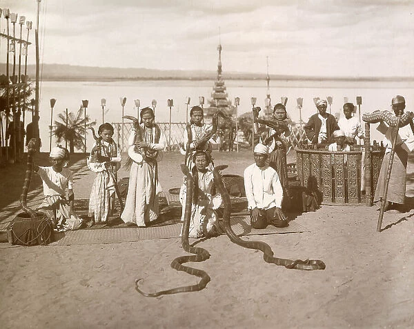 Snake charmers in Burma. Date: circa 1916