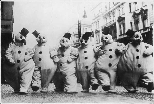 Six Snowmen. This is how a party of merrymakers appeared in the streets