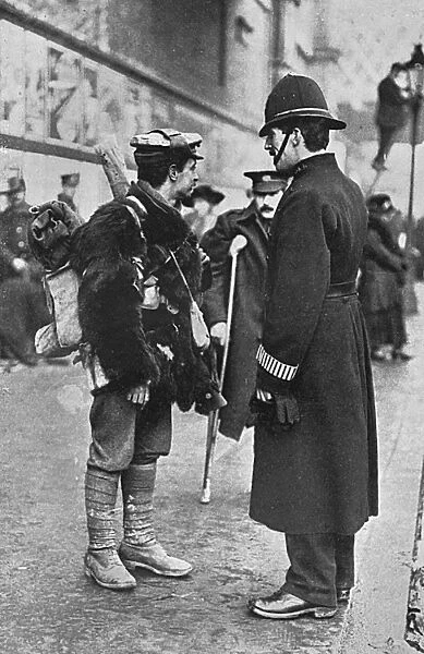 A soldier asks for directions, London, WW1