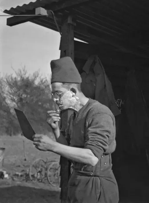 Framed Print : Soldier shaving in the open air at a camp Framed Print : Soldier shaving in the open air at a camp