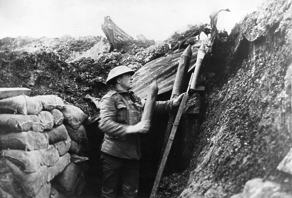 Soldier in trench with signals rockets, WW1