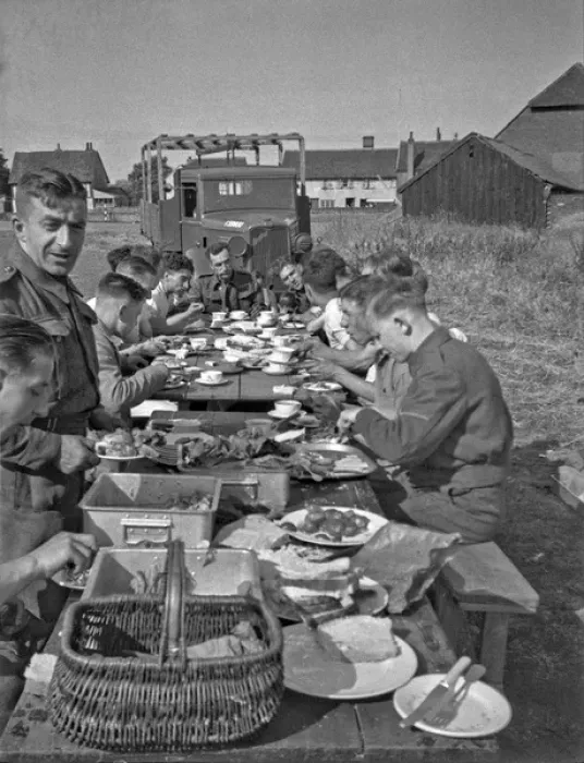 Framed Print : Soldiers eating in the open air at a camp Framed Print : Soldiers eating in the open air at a camp