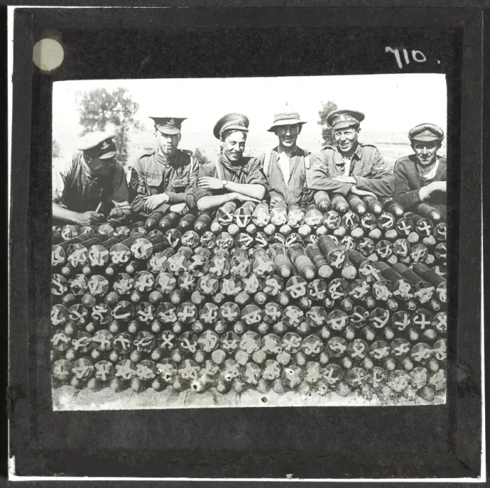 Framed Print : Soldiers lean on pile of 18-pounder shells nr Becourt Wood Framed Print : Soldiers lean on pile of 18-pounder shells nr Becourt Wood