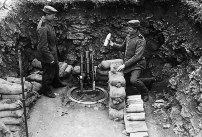 Framed Print : Two soldiers loading a mortar Framed Print : Two soldiers loading a mortar
