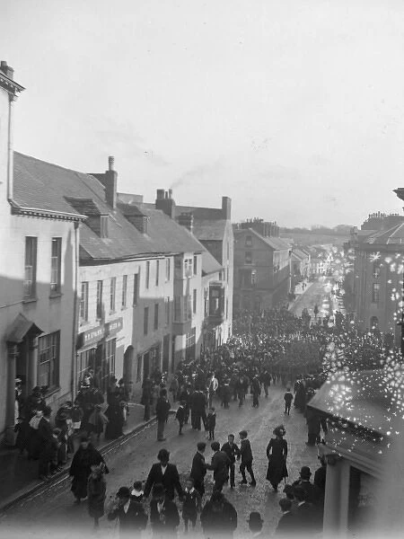 Soldiers parade up High Street, Haverfordwest, South Wales