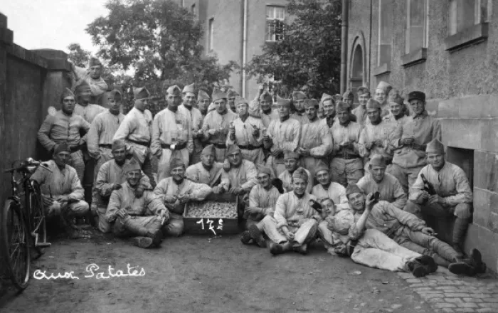 Framed Print : Soldiers posing for a photo with a box of potatoes Framed Print : Soldiers posing for a photo with a box of potatoes