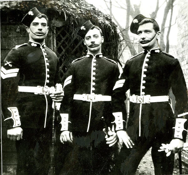 Three soldiers in walking out uniform
