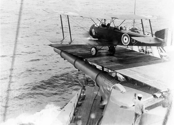 Sopwith 1 Strutter biplane taking off from a ship, WW1
