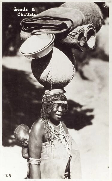 South African woman carrying goods on her head