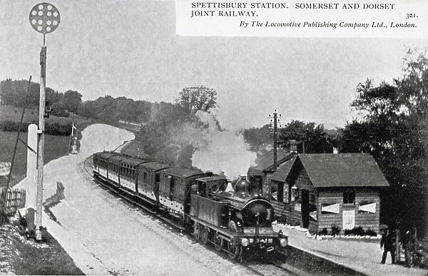 Spettisbury station with train under steam