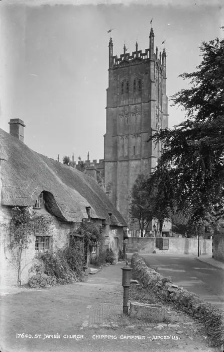 Framed Print : St. James Church and Thatched Cottages Framed Print : St. James Church and Thatched Cottages