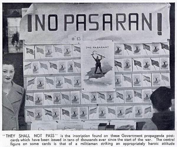 A stall selling Republican propaganda postcards, emblazoned with the famous Republican war-cry No Pasaran (They shall not pass), Madrid, 1936. Date: 1936
