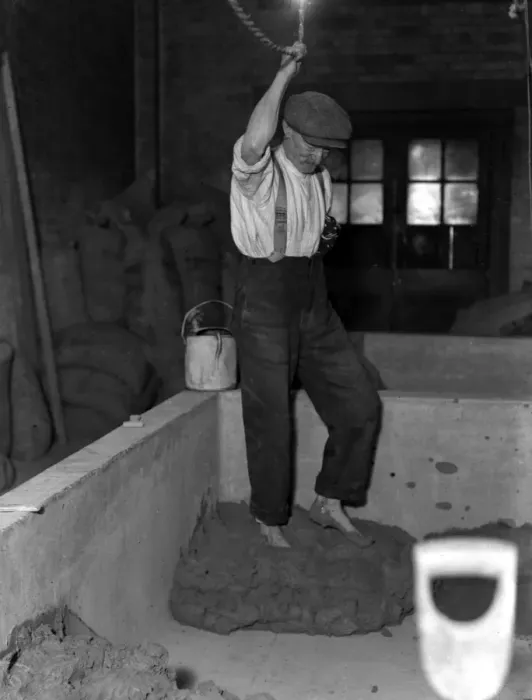Framed Print : Stamping Clay by Foot Framed Print : Stamping Clay by Foot
