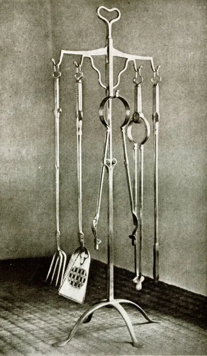 Framed Print : Stand of fire irons in polished wrought iron Framed Print : Stand of fire irons in polished wrought iron