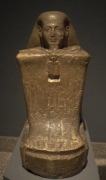 Statue-cube of the vizier Nes-Pekashutty. Egypt