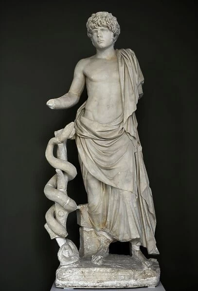 Statue of a young Roman depicted as Asklepion. From