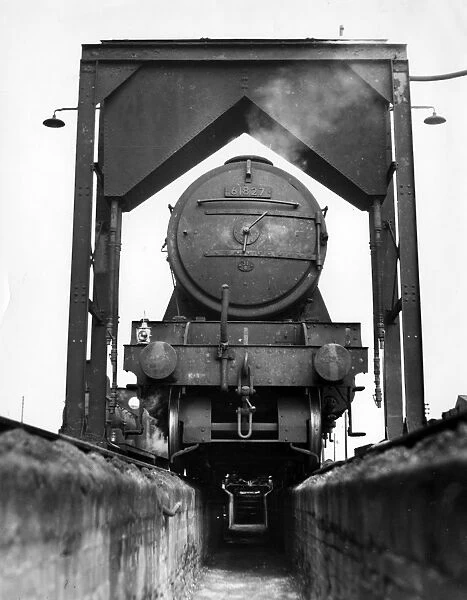 Steam locomotive above inspection pit, Cambridge